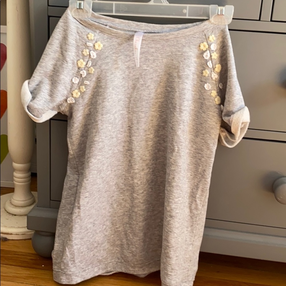 grey shirt with flowers